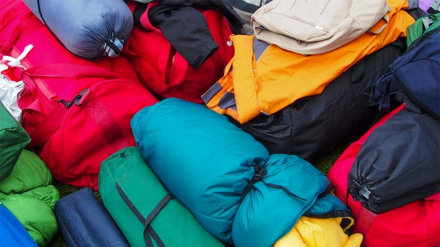 Place your sleeping bag in a large container or stuff sack